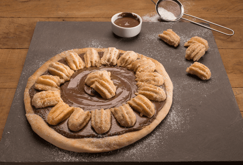 Pizza doce: aprenda uma receita de pizza de churros - Revista